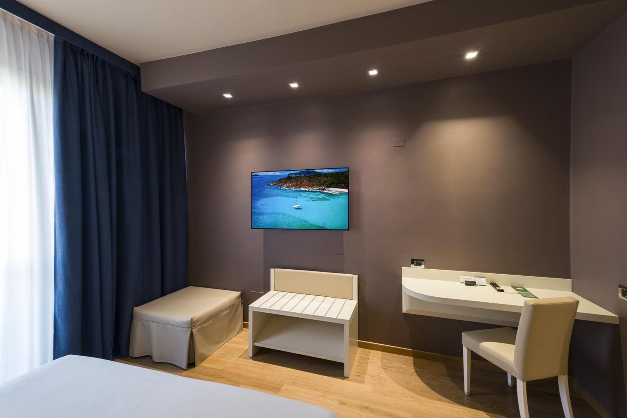 Hotel Touring Ferrara Værelse billede